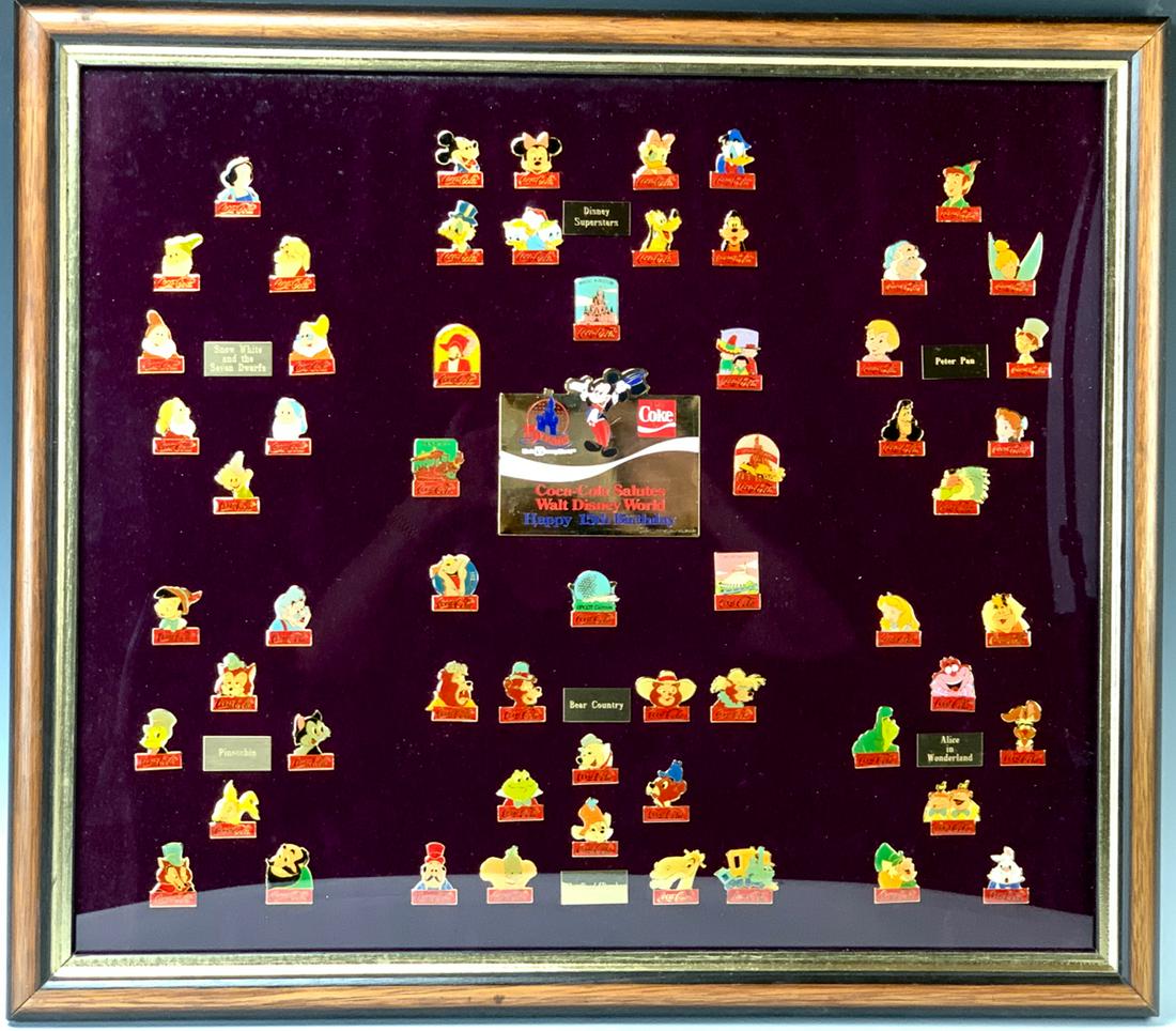 5 Coca Cola Salutes Disney 15 year Anni. Buttons: 1986, Coca Cola salutes 15th anniversary, 60 pin back framed sets in original boxes, limited editions, 7 family name place cards surrounded by the pins, Snow White and the Seven Dwarves, Pinocchio, Mr