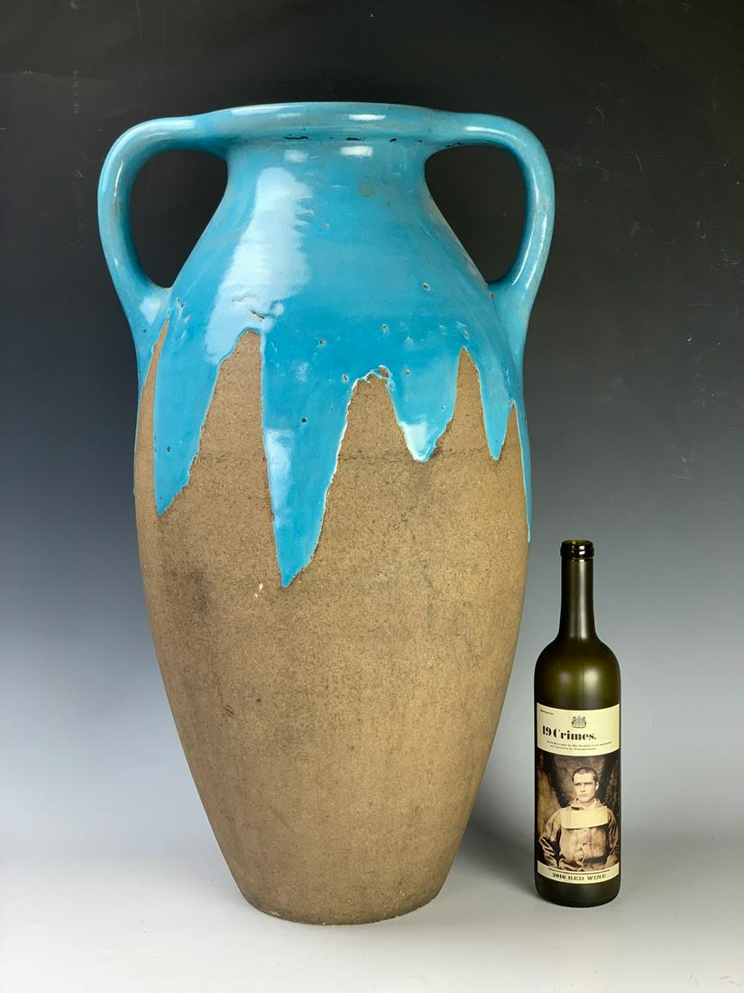 Rookwood Faience Floor Vase w/ Blue Drip Glaze: Double handled Faience pottery floor vase, decorated with a turquoise blue drip glaze, signed on bottom with Rookwood early mark of 1 flame "410 3336Y", very good condition, 26.5" height