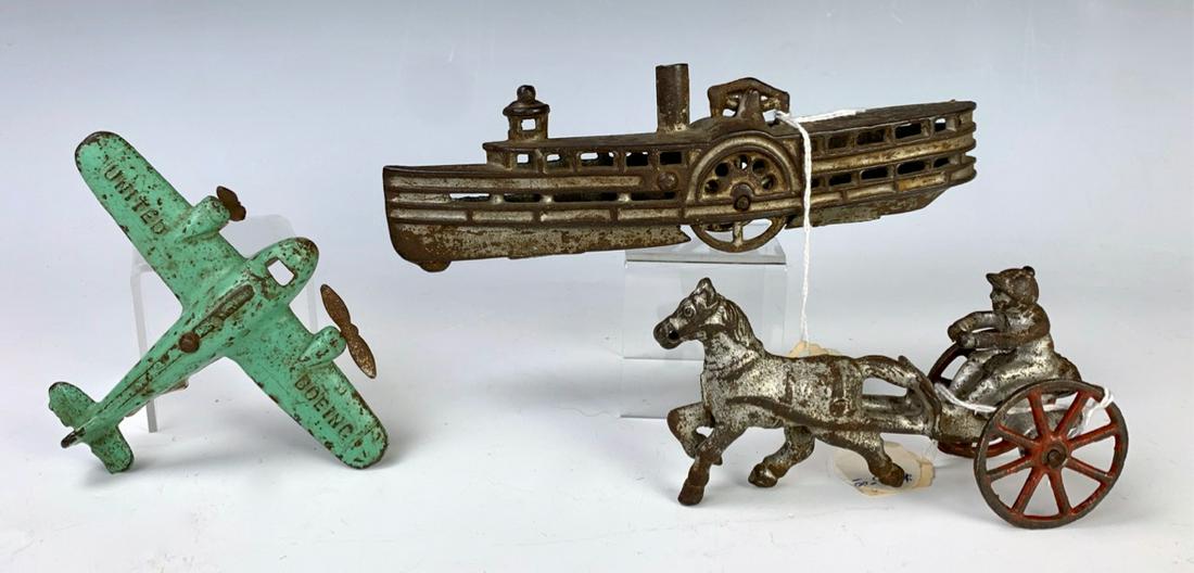 Cast Iron Steamship, Plane & Jockey w/ Horse: Having a vintage cast iron paddlewheel steamship (Hubley?), cast iron Arcade twin propeller plane AMC 361 and a cast iron jockey and horse, iron parrot doorstop, wear to paint commensurate with age, 7