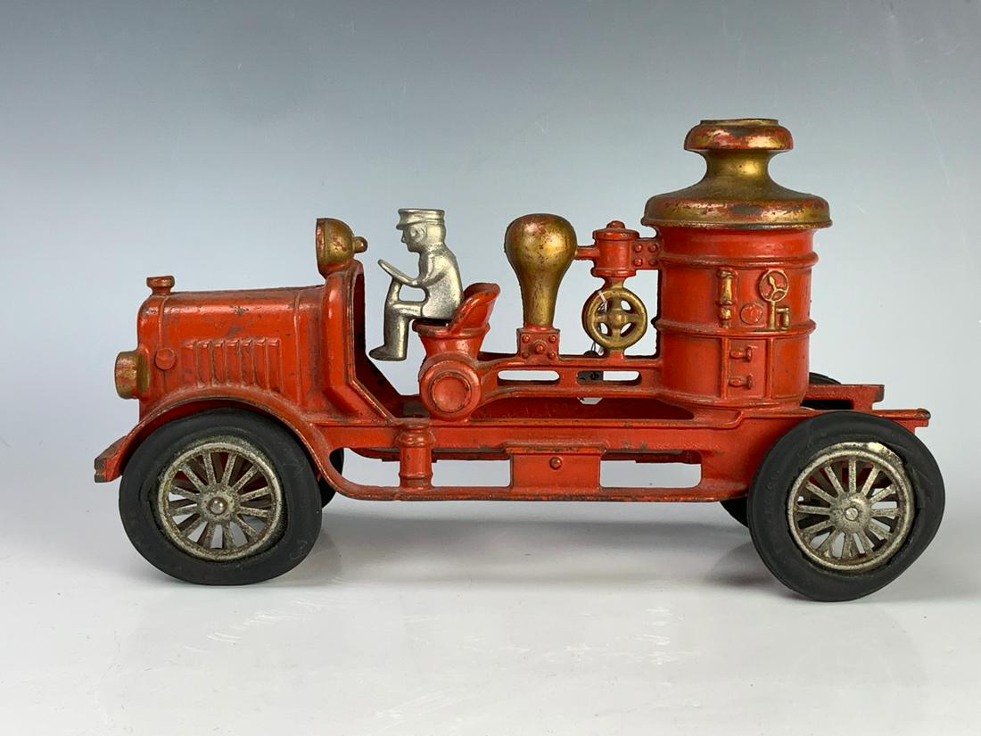 Hubley Cast Iron Vintage Fire Engine Pumper: Circa 1930's, Hubley fire pumper with metal spoked rubber wheels, rubber tires marked "Hubley Mfg.", good condition, 11.25" length