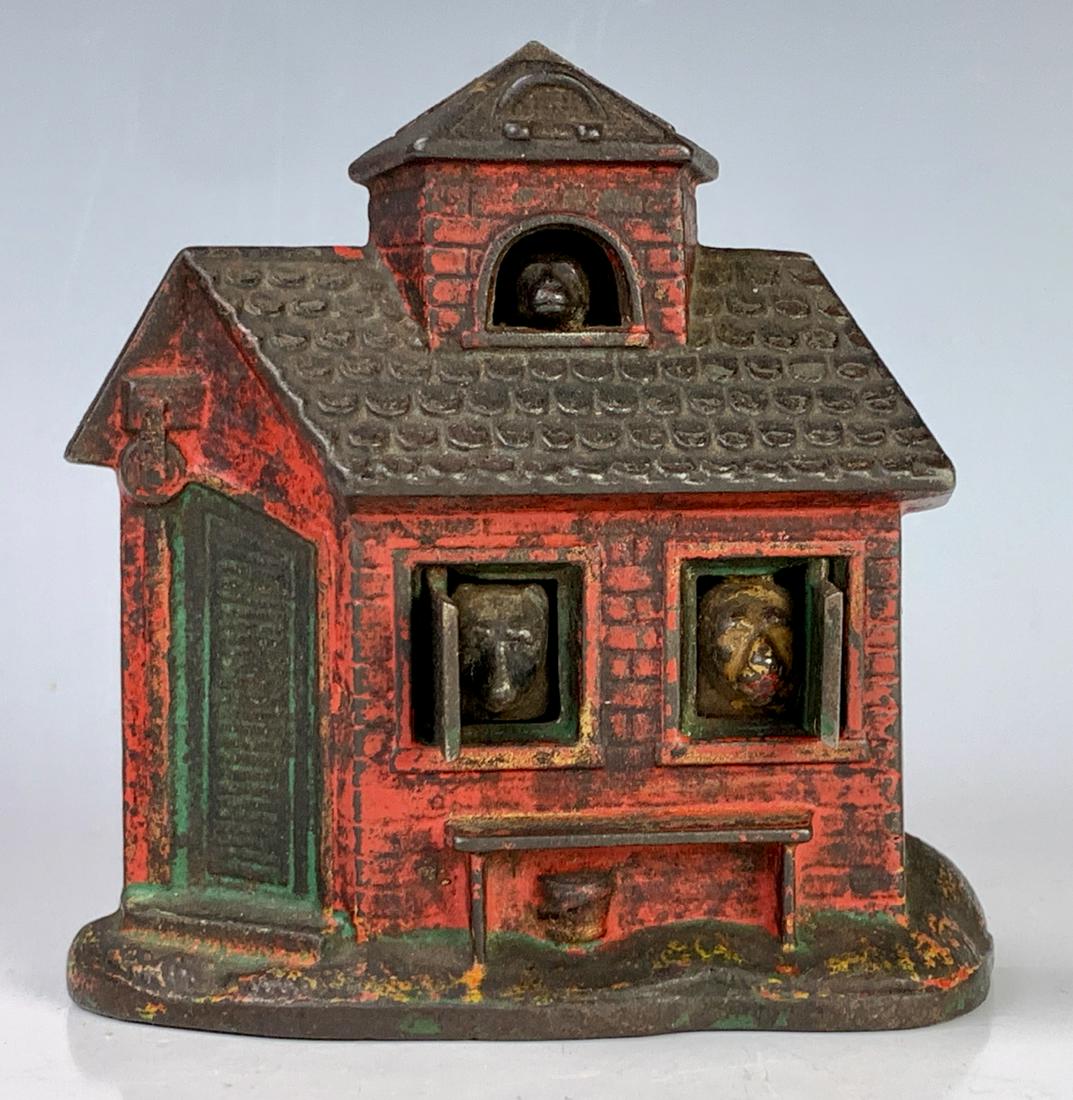 Rare Kyser and Rex 200 Cast Iron Mechanical Bank: Circa 1880, place a coin in the slot and press the face of the monkey, this causes the lion and bear to appear in the window as the shutter opens, marked on back "Press the Monkey 134", no key, 4.25" 