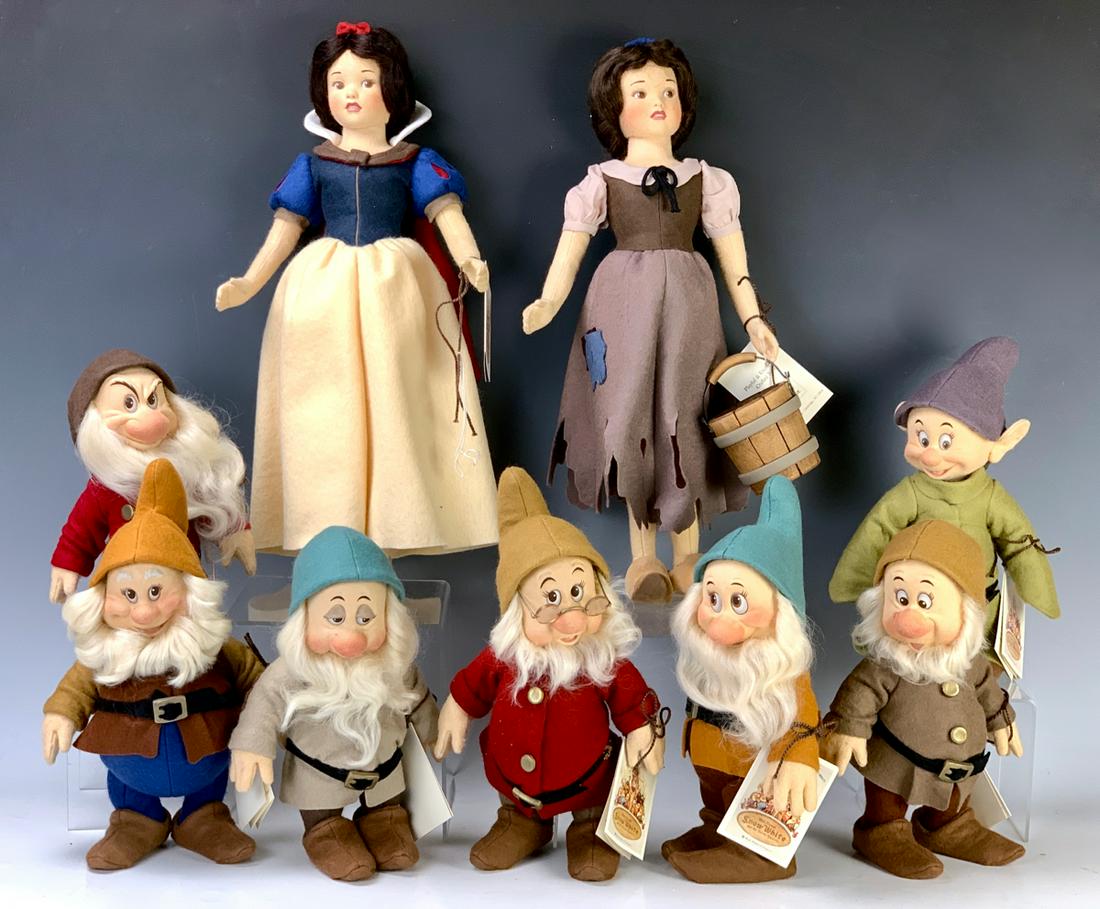 R. John Wright "Snow White & Seven Dwarves": Circa 1987, two Disney Snow White dolls and the seven dwarves by R. John Wright, Cambridge NY, molded felt, fully jointed, includes Snow White in rags 573/1000, Snow White as a princess 535/2500, the