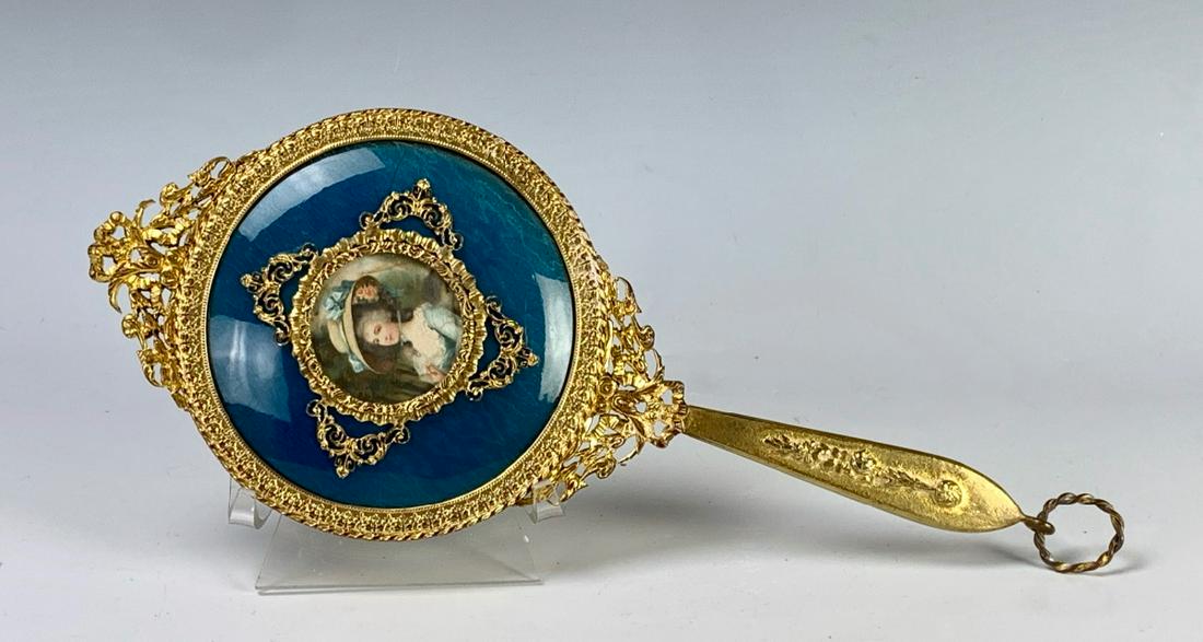 Enamel & Brass Hand Mirror with Miniature Print: Brass frame and round blue green enamel back with an original round miniature painting, mirror in fine condition, slight wear to brass commensurate with age, 11" height