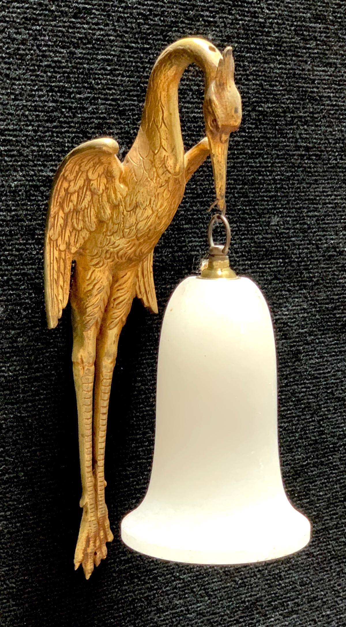 Art Deco Bronze & Alabaster Swan Sconce: Circa 1930, French work having a gilt bronze swan wall sconce, holding from it's mouth an alabaster shade, needs to be electrified, 16" height *Wiring should be inspected before use*