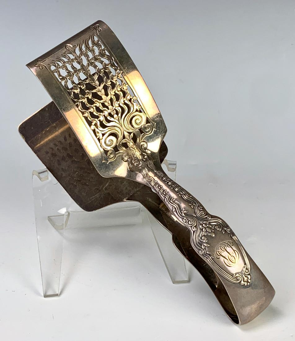 Tiffany & Co Sterling "Broom Corn" Asparagus Tongs: Circa 1896, marked "Tiffany & Co. Sterling Pat 189C.", has monogram, 184 grams, 5.92 troy ounces, good condition, 7.5" length
