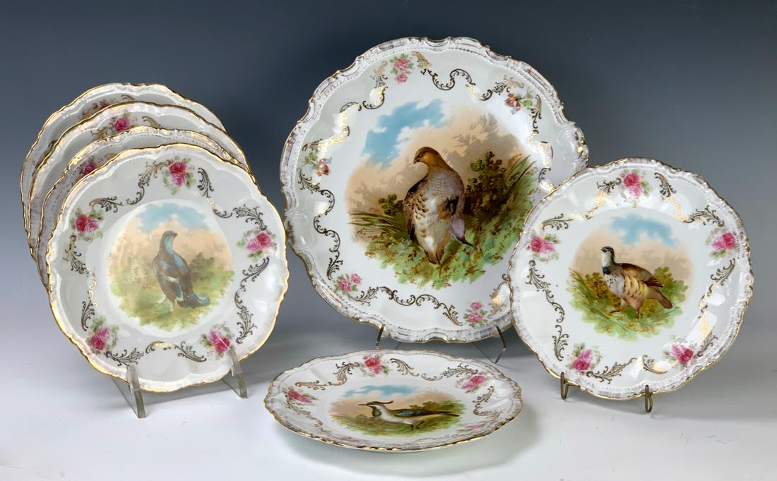 Bavaria Set of 7 Game Plates C. 1930: Having a main platter and 6 side dishes of transferware, each depicting a game bird, each marked with Bavarian factory mark, very good condition, 12.5" diameter largest