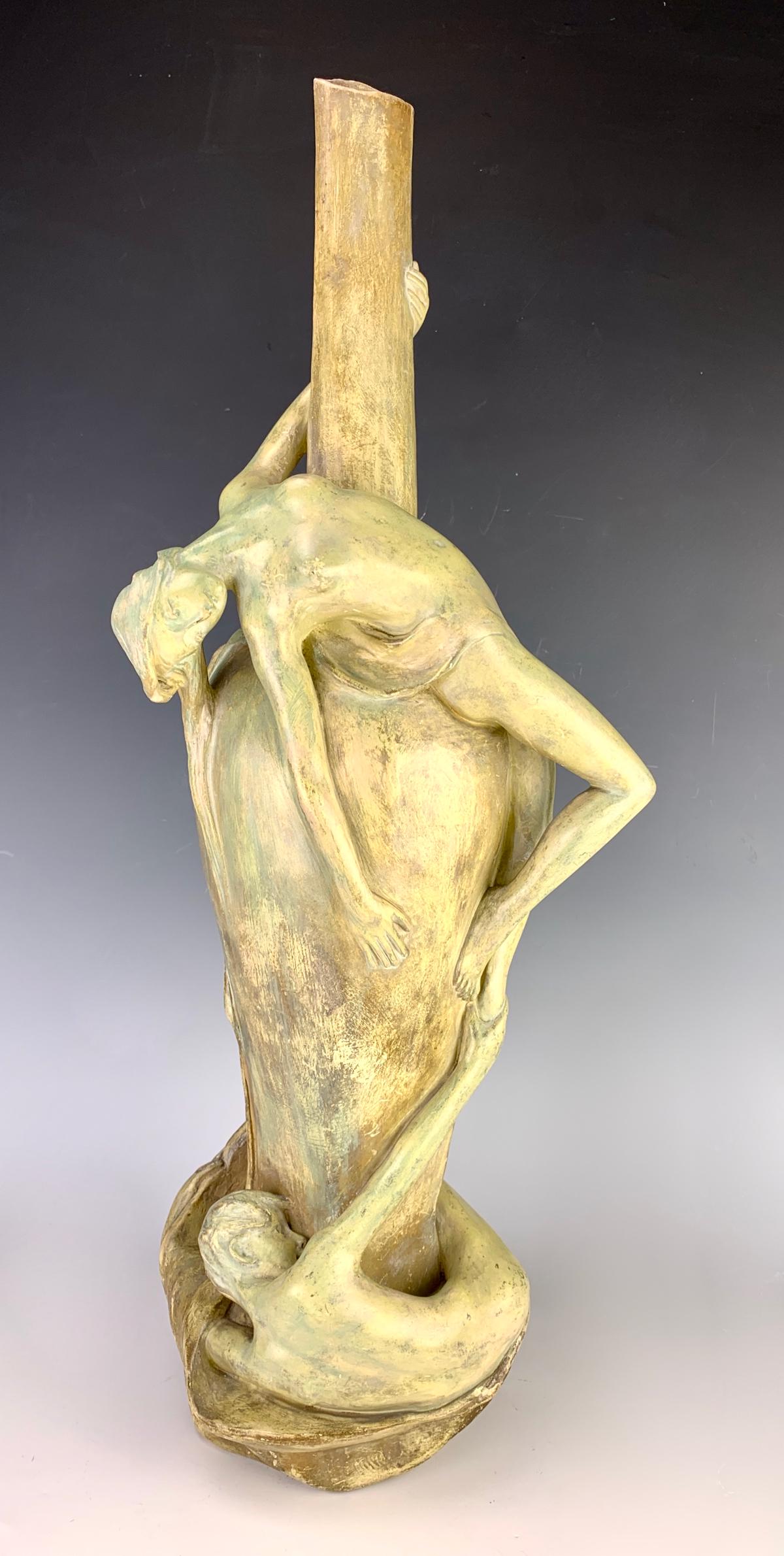 Goldscheider? Art Nouveau Figural Vase: Circa 1900, artist signed Tegner, a beautifully designed art nouveau earthenware vase with a draped nude nymph and nude male, marked with form numbers 0806, 79, 59, normal wear commensurate with age, 