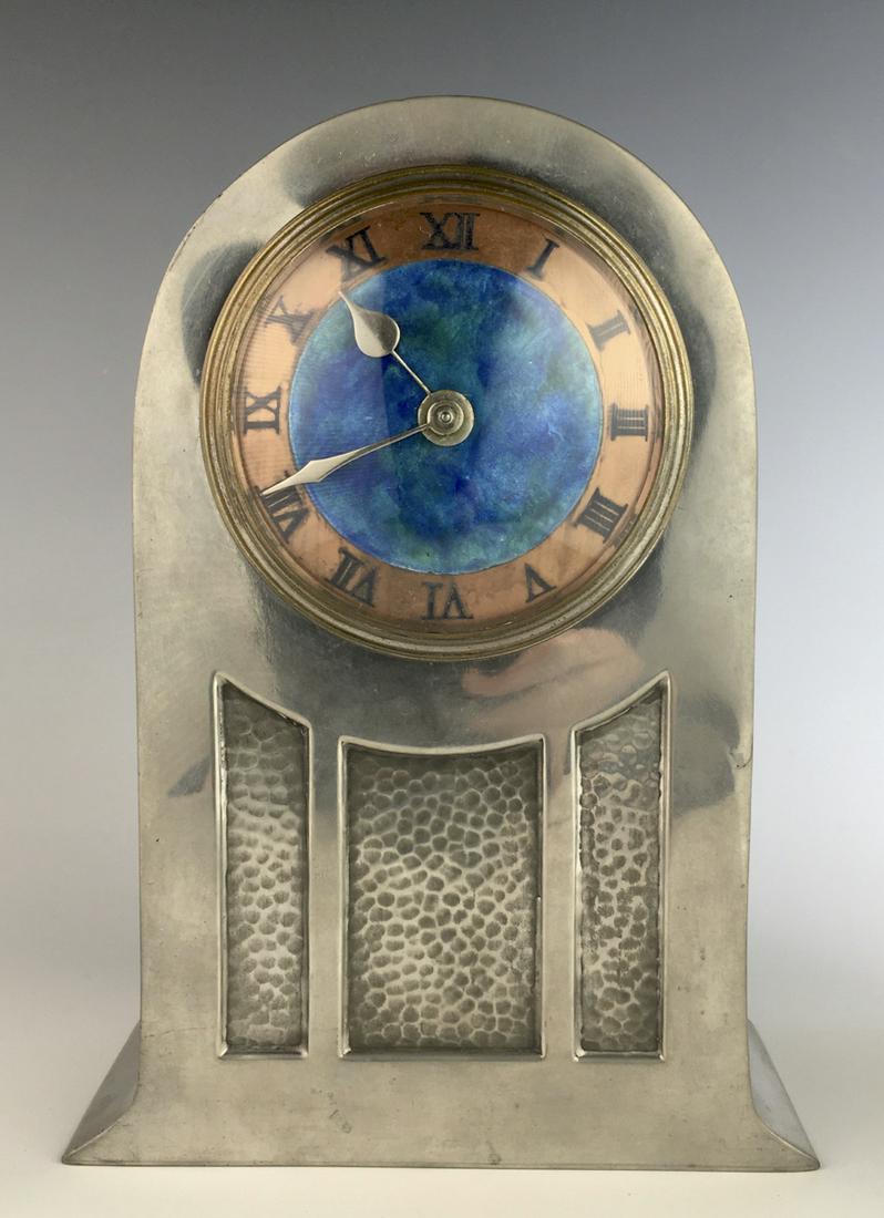 Liberty & Co. Tudric Clock: Circa early 20th century, English Tudric clock, pewter, copper and enamel, stamped "Tudric 01269 Made in England", has French wind up movement, very good condition, running at time of auction but not 