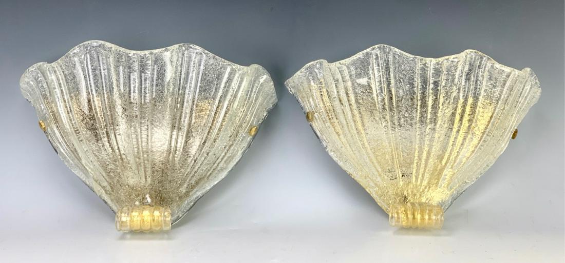 Pair Mid Century Murano Glass Wall Sconces: Great looking wall sconces from the 1960s, matched pair of shell like sconces, upper part is clear mottled glass with gold in the bottom part, one sconce has a restored crack, 9.5" x 14"