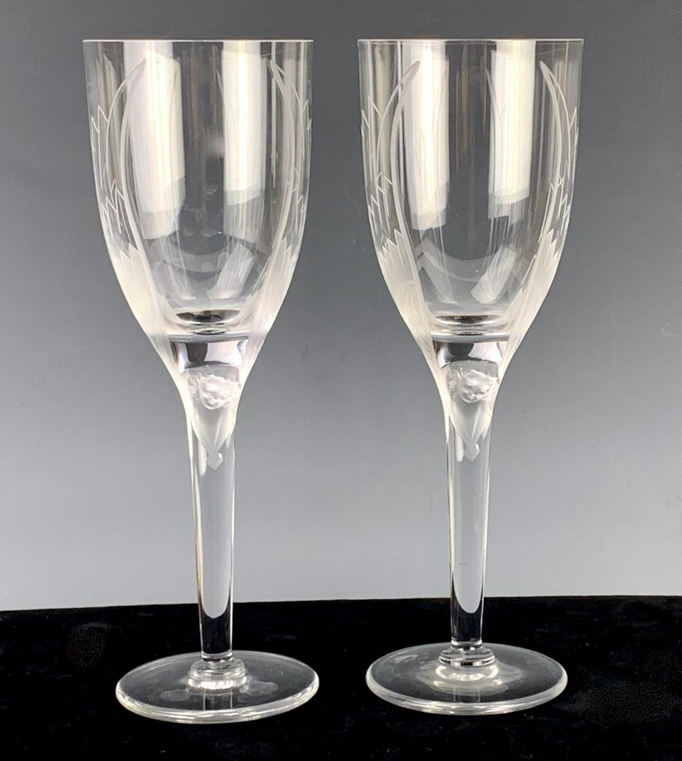 Pair of Lalique Crystal "Angel" Flutes: Each signed "Lalique, France", very good condition, 8" height