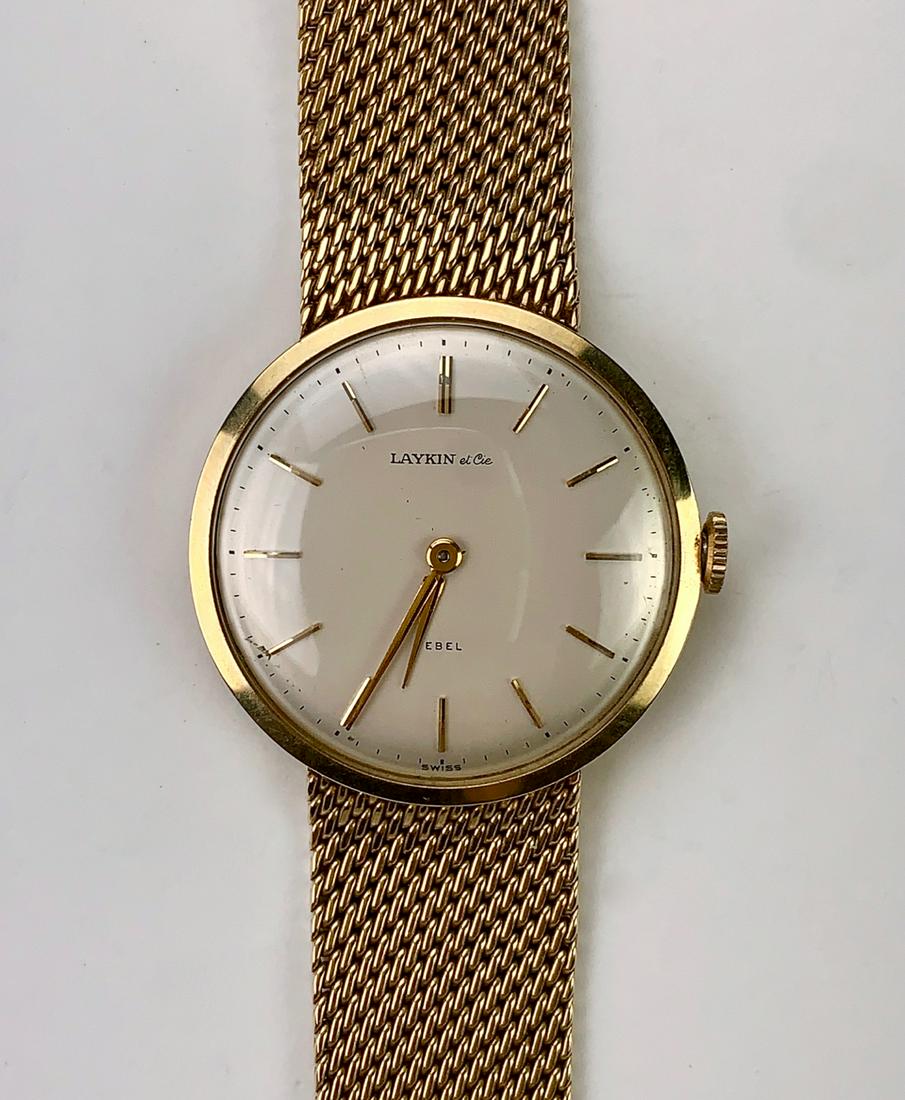 14K YG Ebel Mans Wristwatch: Dial marked "Laykin & Cie, Ebel, Swiss", case marked "14K", 56 grams with works, good condition, 6.5" length *Clocks and watches are not guaranteed**Video available upon request*