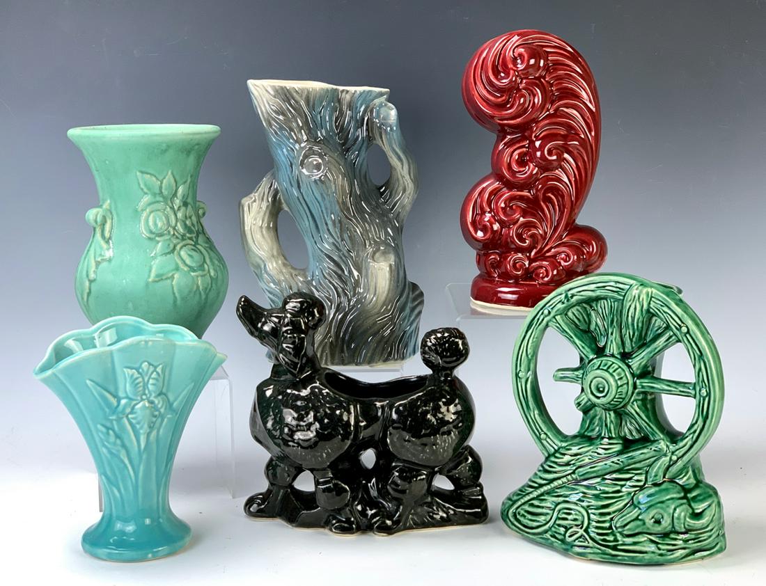 6 Pieces of American Art Pottery: Consisting of poodle planter, wagon wheel planter, tree trunk planter, cornucopia planter, and 2 flower vases, good condition, 9.5" tallest