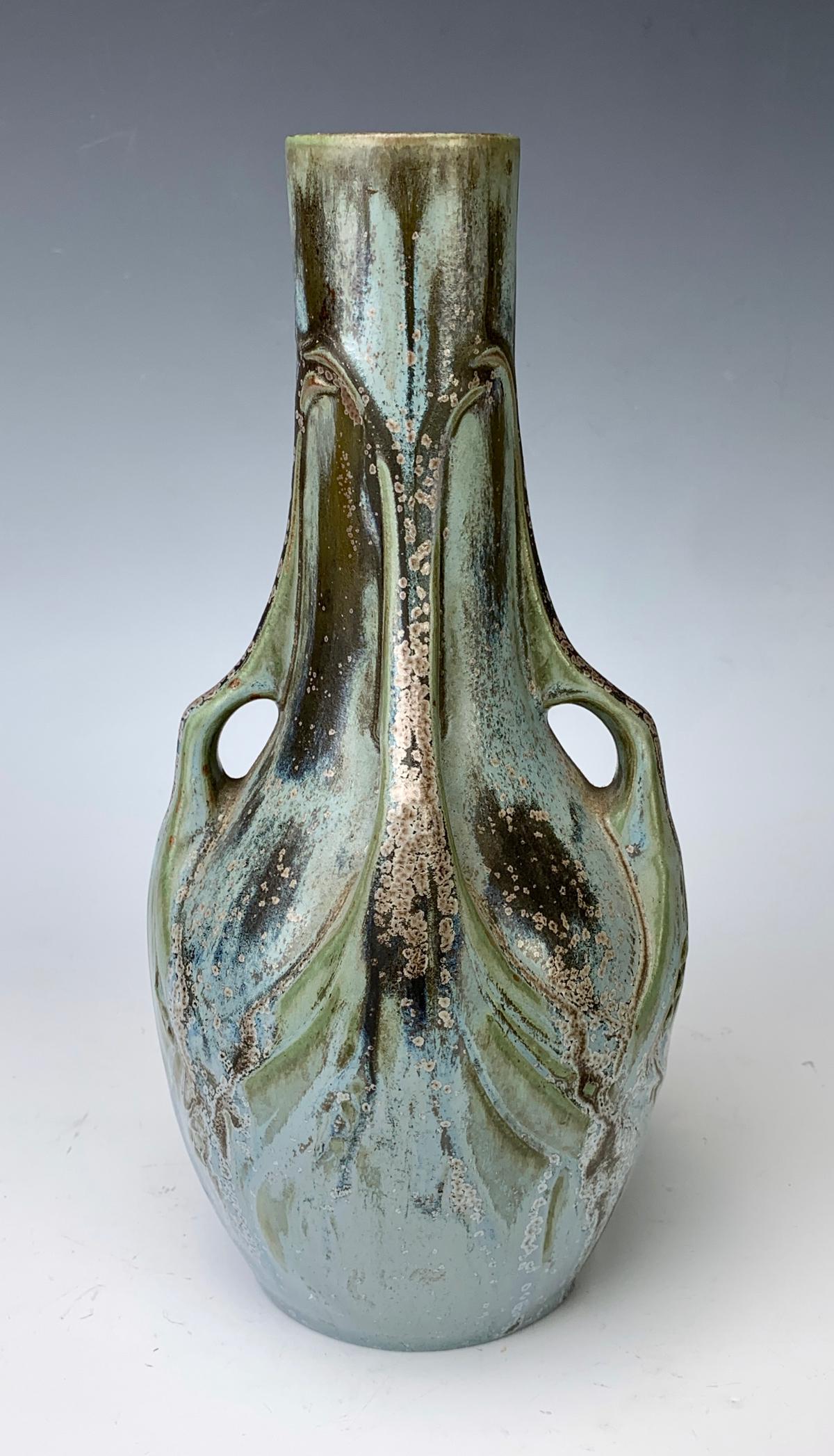 Denbac Vase, Four Handled Form: Denbac pottery vase, four handles covered in a green and brown crystalline glaze, signed, very good condition, 10.25" height