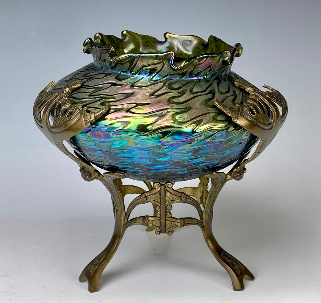 Antique Loetz, Kralik Bronze Art Nouveau Vase: Having a green gold iridescent wavy bowl sitting inside a bronze 3 footed frame, very good condition, 8.25" x 8"