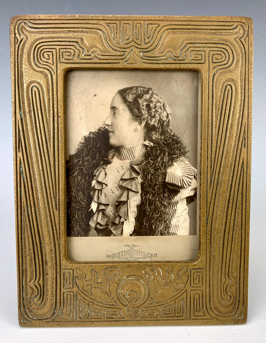 Tiffany Studios Chinese Pattern Picture Frame: Tiffany Studios Chinese pattern picture frame, dore bronze frame in the Chinese pattern, signed "Tiffany Studios, New York 1761", good condition, wear to patina commensurate with age, 9" x 6.75"