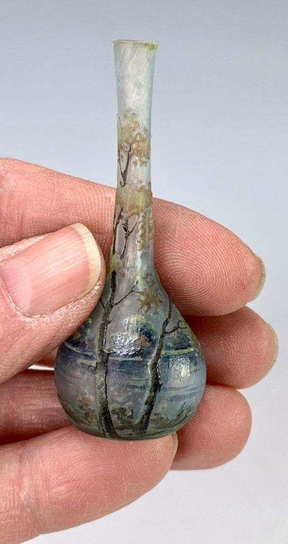 Daum Nancy Miniature Scenic Cameo Vase: Daum Nancy spring landscape miniature cameo vase depicting a lake scene with trees, having a bulbous bottom and a long neck, very good condition, 2.625" height