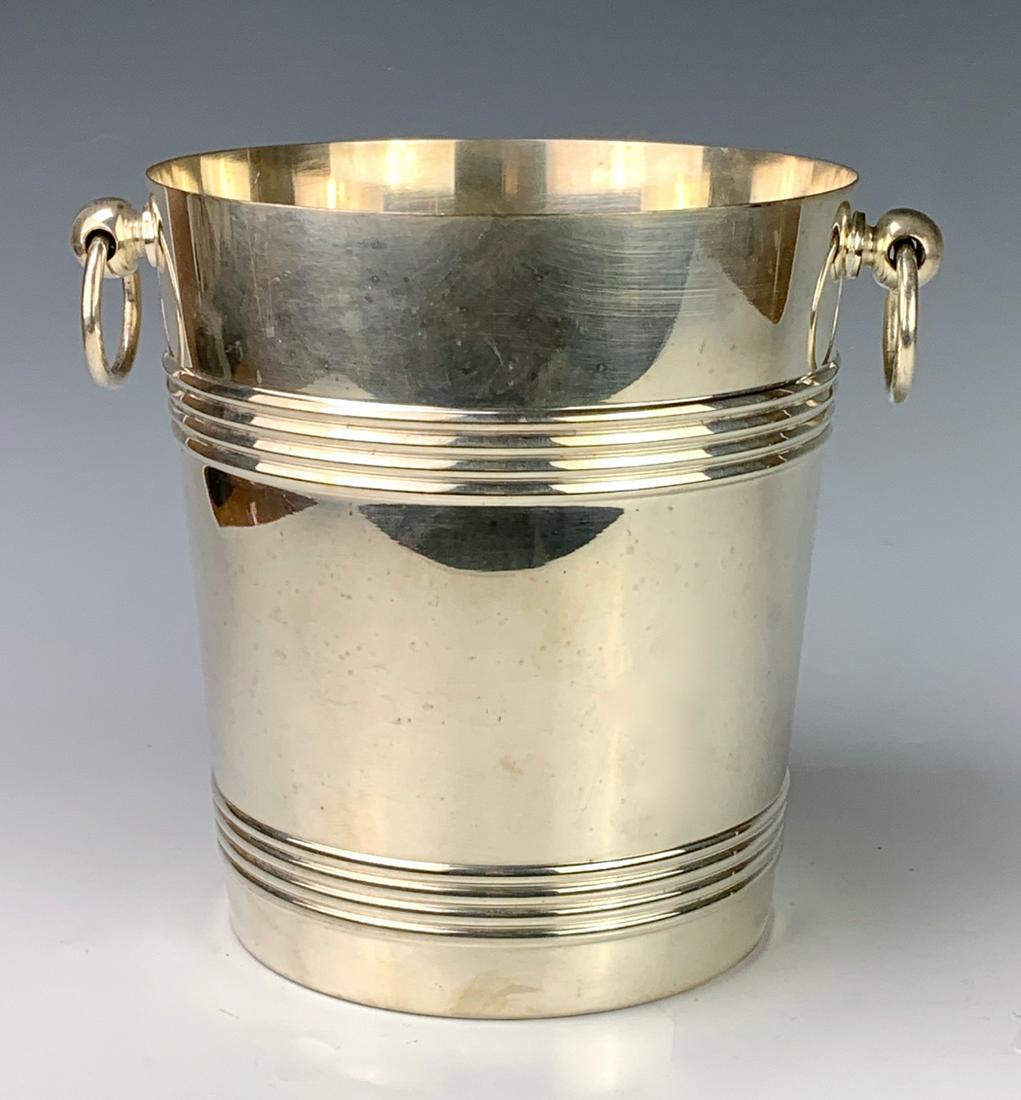 Christofle Silver Plated Ice Bucket: Made in France, this silver plated ice bucket with ring handles, having Christofle impressed marks on bottom, good condition, 8.25" x 9" including handles
