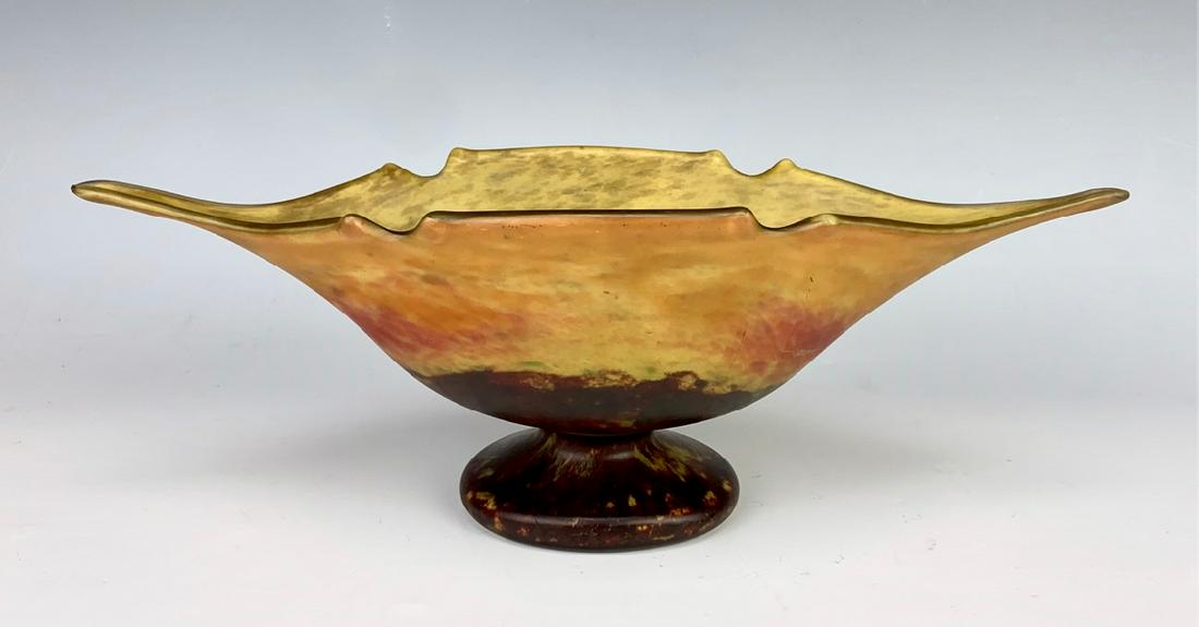 Daum Nancy Mottled Glass Vase C. 1900: Wonderful and unusual shaped Daum Nancy mottled glass pedestal vase, orange yellow body with brown mottled glass pedestal, carved "Daum Nancy" with cross of Lorraine, very good condition, 5" x 14"