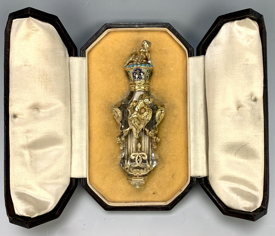 Flask Parfum "The Bubbles Soap" Morel & Duponchel: Rare and important flacon perfume "The Bubbles Soap" in cut quartz crystal with silver and vermeil mount by Morel and Duponchel 1844. Body adorned with 2 large cartouches and foliage where two cherubi