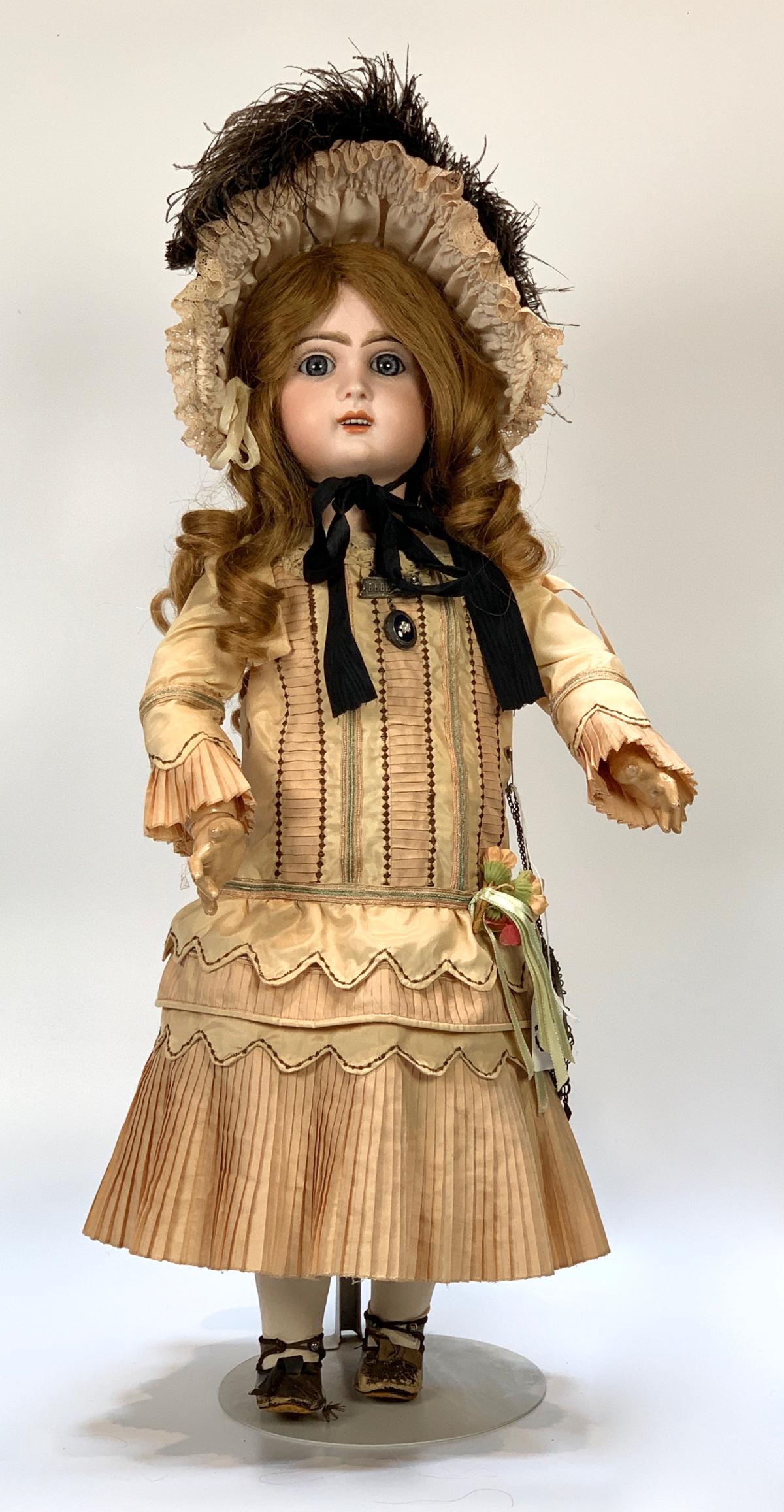 23" Jumeau French Bebe Bisque Head: Open mouth, blue paperweight eyes, pierced ears, head marked incised "10", fully jointed unmarked composition Jumeau body, working "Mama" pull stings, minor paint peeling at joints, newer French human