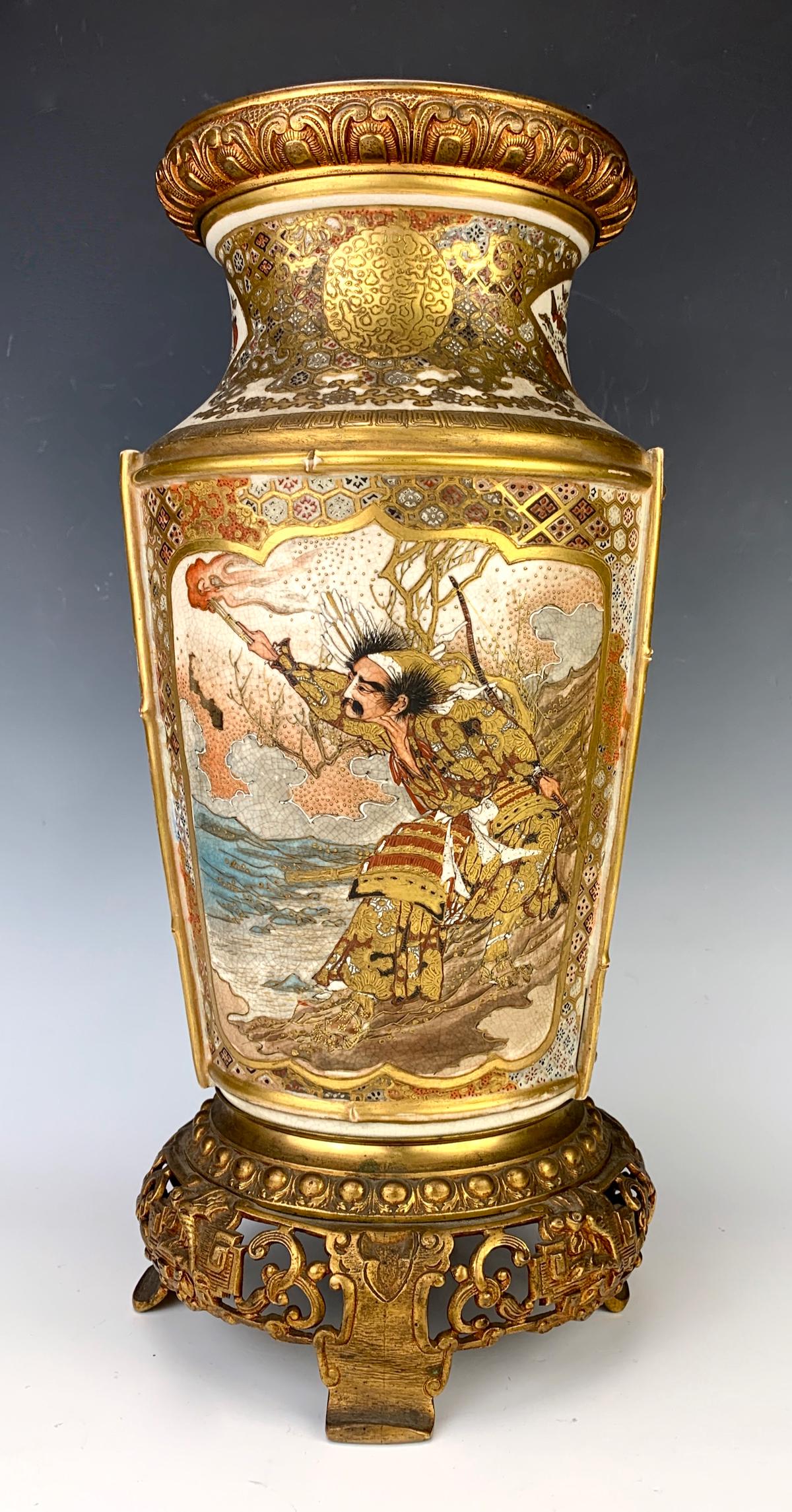 Japanese Satsuma Pottery Bronze Mouthed Vase: Meiji period, hand painted man with flame and gold gilt work, gilt bronze collar and base, very good condition, 15.5" height
