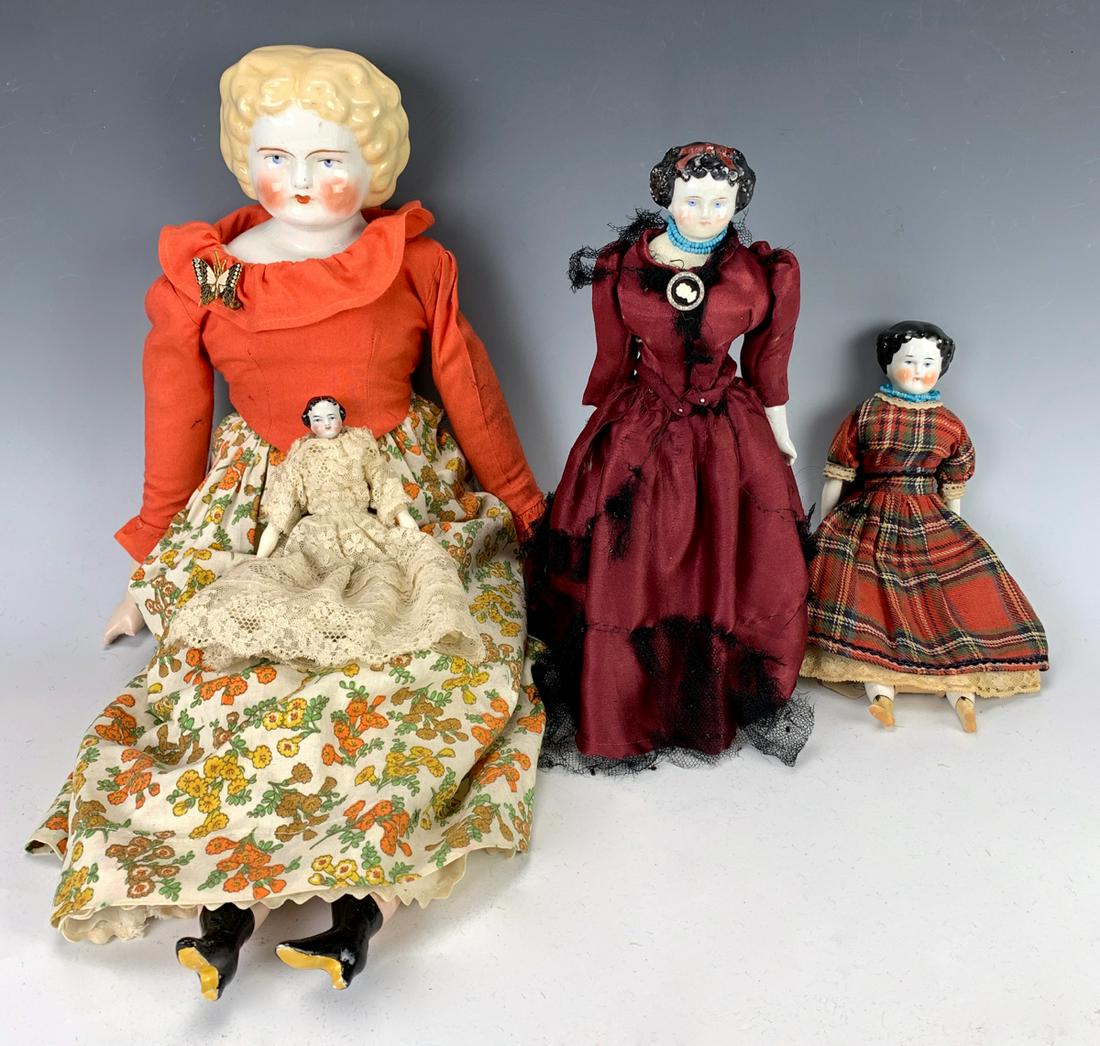 Lot of 4 China Head Dolls: 22" blond hair with extensive crazing to surface of head, age vintage, 3 antique damaged and repaired small antique chinas with black hair, 11" tallest, has crazing on china legs, poor condition