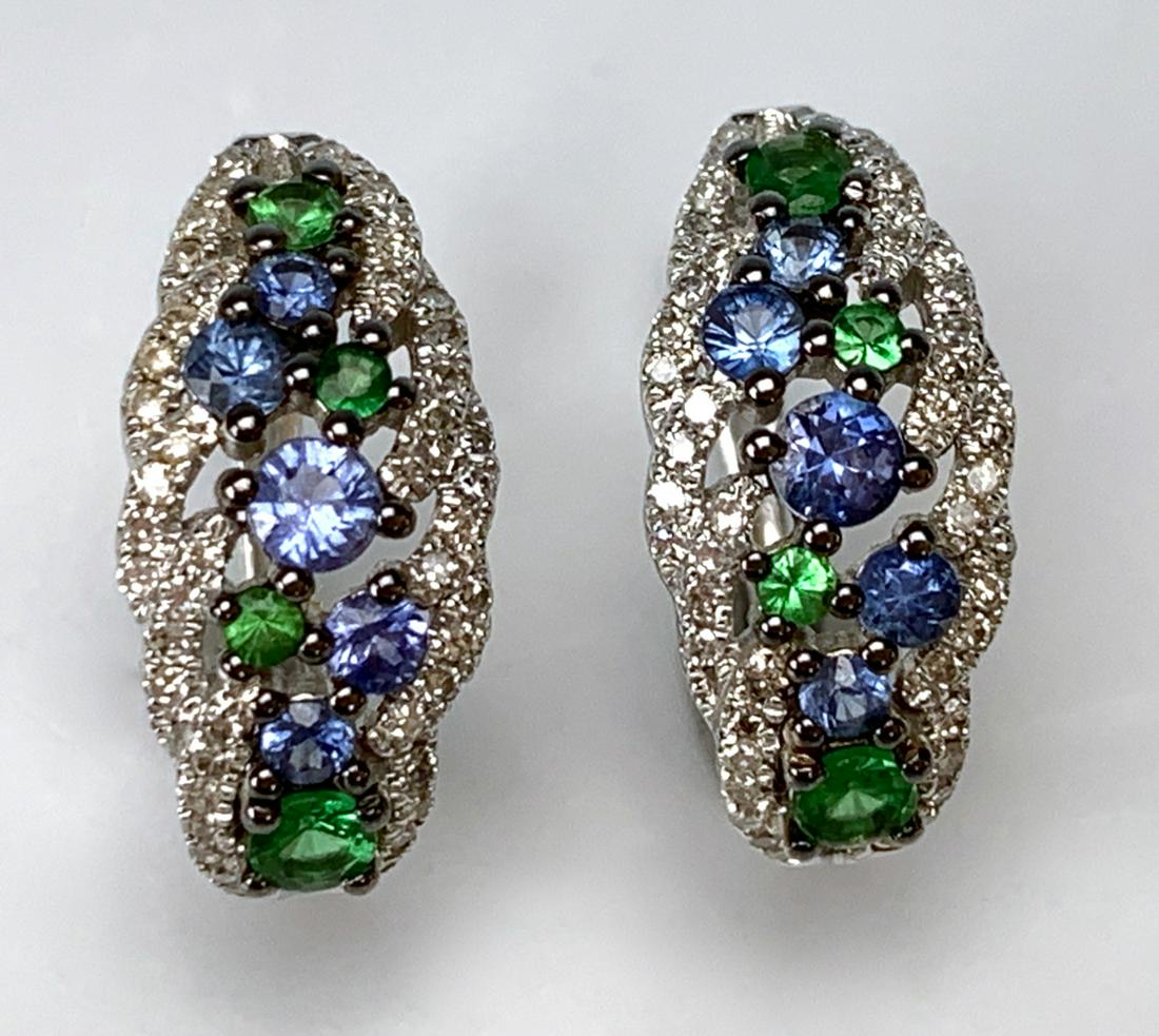 Pair 14K WG Diamond Tanzanite & Sapphire Earrings: Pair of 14K white gold diamond, tanzanite and sapphire earrings, for pierced ears, having 4 small tanzanite stones mixed in with 5 small sapphires, 14K white gold marked "585", surrounded by diamonds,