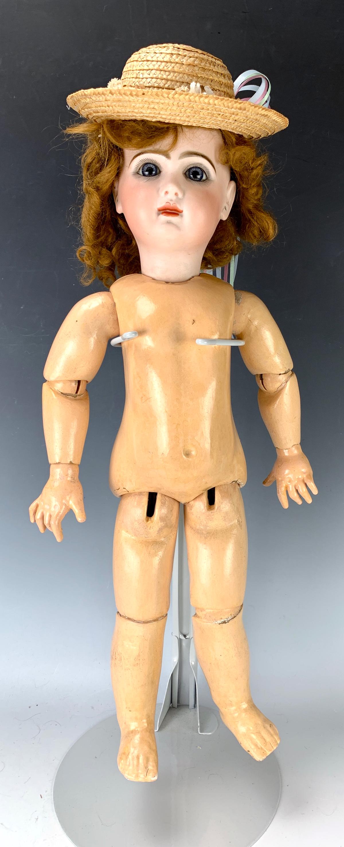 20" French Tete Jumeau Size 9 with Box: French Tete Jumeau size 9 doll with marked box and no lid, head marked with red stamp "Tete Jumeau 9", antique mohair wig and cork pate, original neck screw, fully jointed Jumeau body, marked on lower
