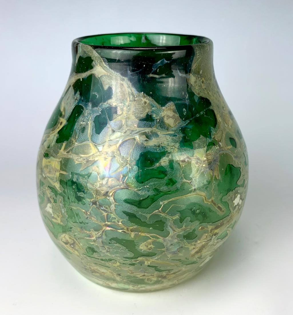 Tiffany Studios Paperweight Vase (As-Is): Rare Tiffany Studios paperweight vase in a green clear body and white inclusions throughout, unfortunately it does have a crack possibly done in the making, signed "L.C. Tiffany, Inc. Favrile 7249", c