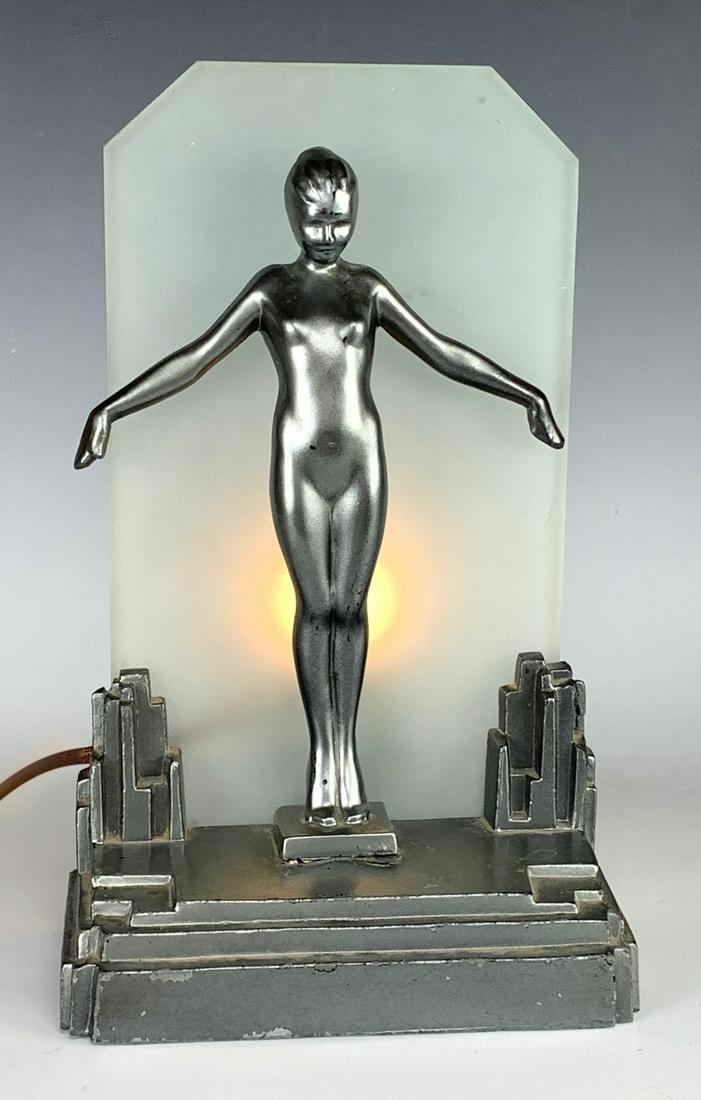 Frankart 1928 Art Deco Luminaire: Charming art deco nude female luminaire signed on rear lower base "Frankart 1928", good condition, minor crack in metal at base of her feet, 11" x 6.5" *Electrical warning: wiring should be inspected