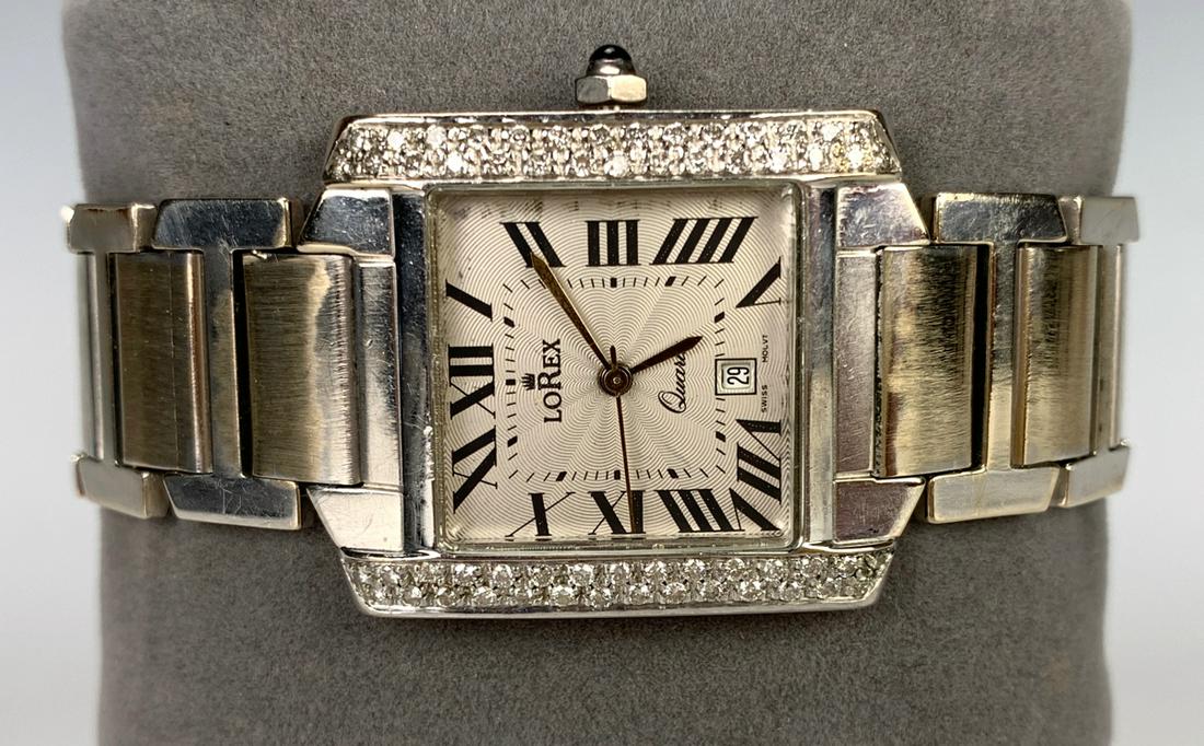 Lorex Stainless Steel Quartz Watch w/ 40ptw Diamonds: Lorex stainless steel quartz watch with 40ptw diamonds, running at time of auction *Clocks and watches are not guaranteed*