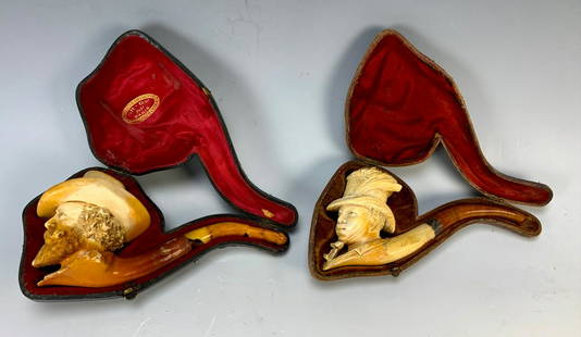 Pair of Antique Meerschaum Pipes w/ Cases: Late 19th century, Turkish antique pipes with cases, included is a fabulous quality carving of a black "dandy" with hat, amber stem and case, the other appears to be a well carved figure of a civil wa