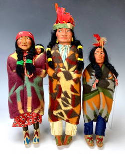 Group of 3 American Indian Skookum Dolls: Group of 3 American Indian Skookum Dolls. Female has papoose baby and is marked. Smaller male is marked. Tallest is 13 1/2", very good condition. Lifetime Collection of Sharon McDowell, Simi