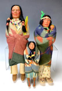 Group of 3 American Indian Skookum Dolls: Group of 3 American Indian Skookum Dolls. Female has papoose baby. Tallest is 15 1/2".very good condition. Lifetime Collection of Sharon McDowell, Simi Valley, CA