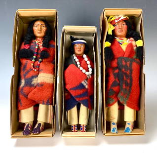 Group of 3 American Indian Skookum Dolls: Group of 3 American Indian Skookum dolls in their original boxes. Two dolls marked under foot. Tallest 11 1/2". Very good condition. Lifetime Collection of Sharon McDowell, Simi Valley, CA