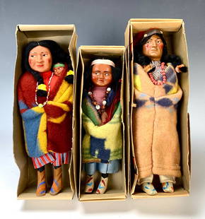 Group of 3 American Indian Skookum Dolls: Group of 3 American Indian Skookum dolls in their original boxes. Child doll is marked under foot. Tallest 11 1/2". Very good condition. Lifetime Collection of Sharon McDowell, Simi Valley, CA