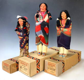 Group of 3 American Indian Skookum Dolls: Group of 3 American Indian Skookum dolls, all in their original boxes. Female has papoose baby. Tallest is 16", middle sized doll is marked under foot. Very good condition. Lifetime Collection of