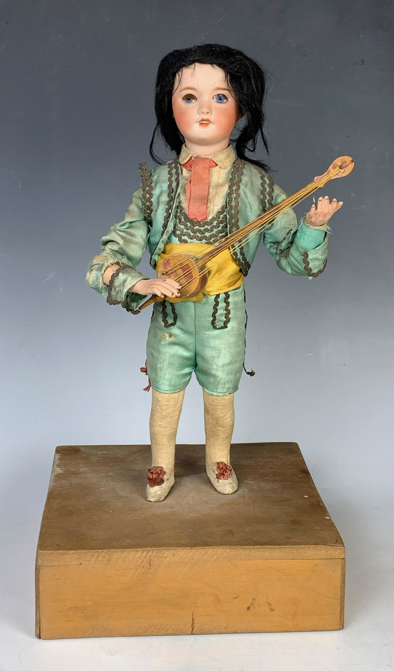 Roullet Decamps Spanish Banjo Player Automaton: Late 19th century, automaton of a Spanish banjo player, when wound he plays the banjo with music playing, bisque head with blue glass eyes, good condition, needs minor repair to clothing, on/off switc