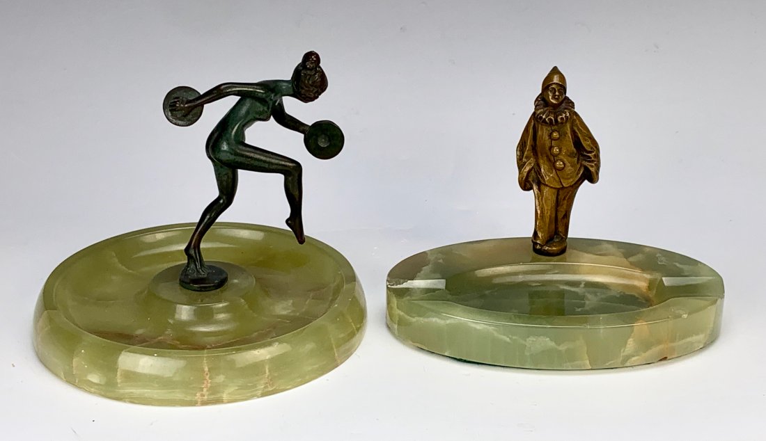 Pair Bronze & Onyx Art Deco Ashtrays C.1920: Having a pair of art deco bronze and onyx ashtrays from the 1920s, one dancing girl with cymbals and the other of a pierrot which is signed but indiscernible, both mounted atop green onyx dishes, good