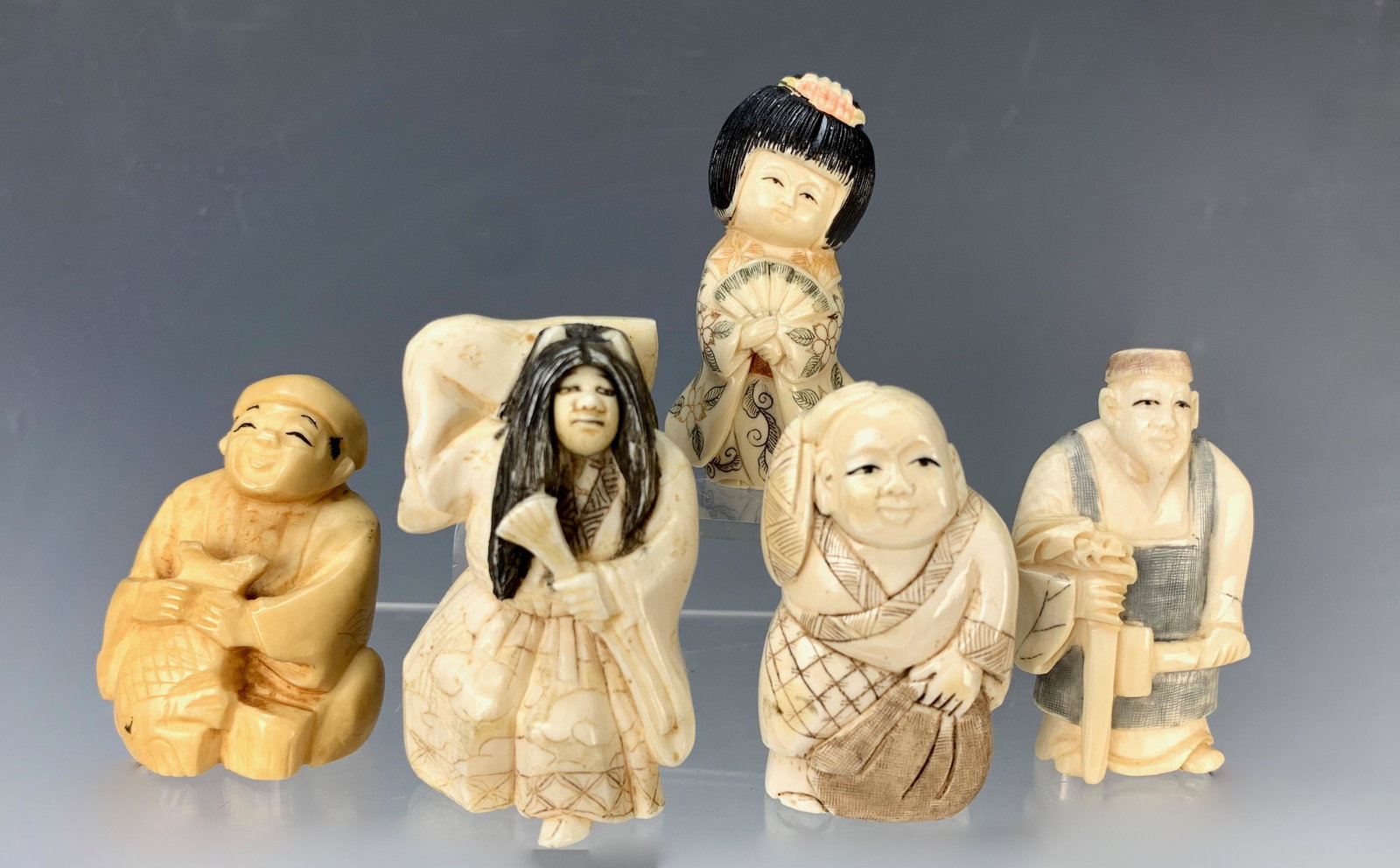 Group of 5 Bone Carved Japanese Netsukes: All 5 nicely carved, 4 of them are signed. 2" tallest. Good condition.