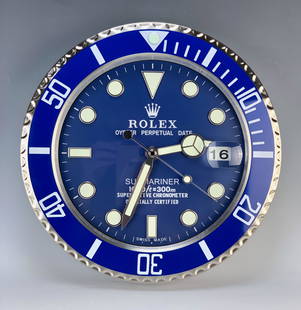 Rolex Shop Display Advertising Clock: Battery powered, quartz movement, not made by Rolex. It is a replica. 13.25" diameter. Condition: very good, working.