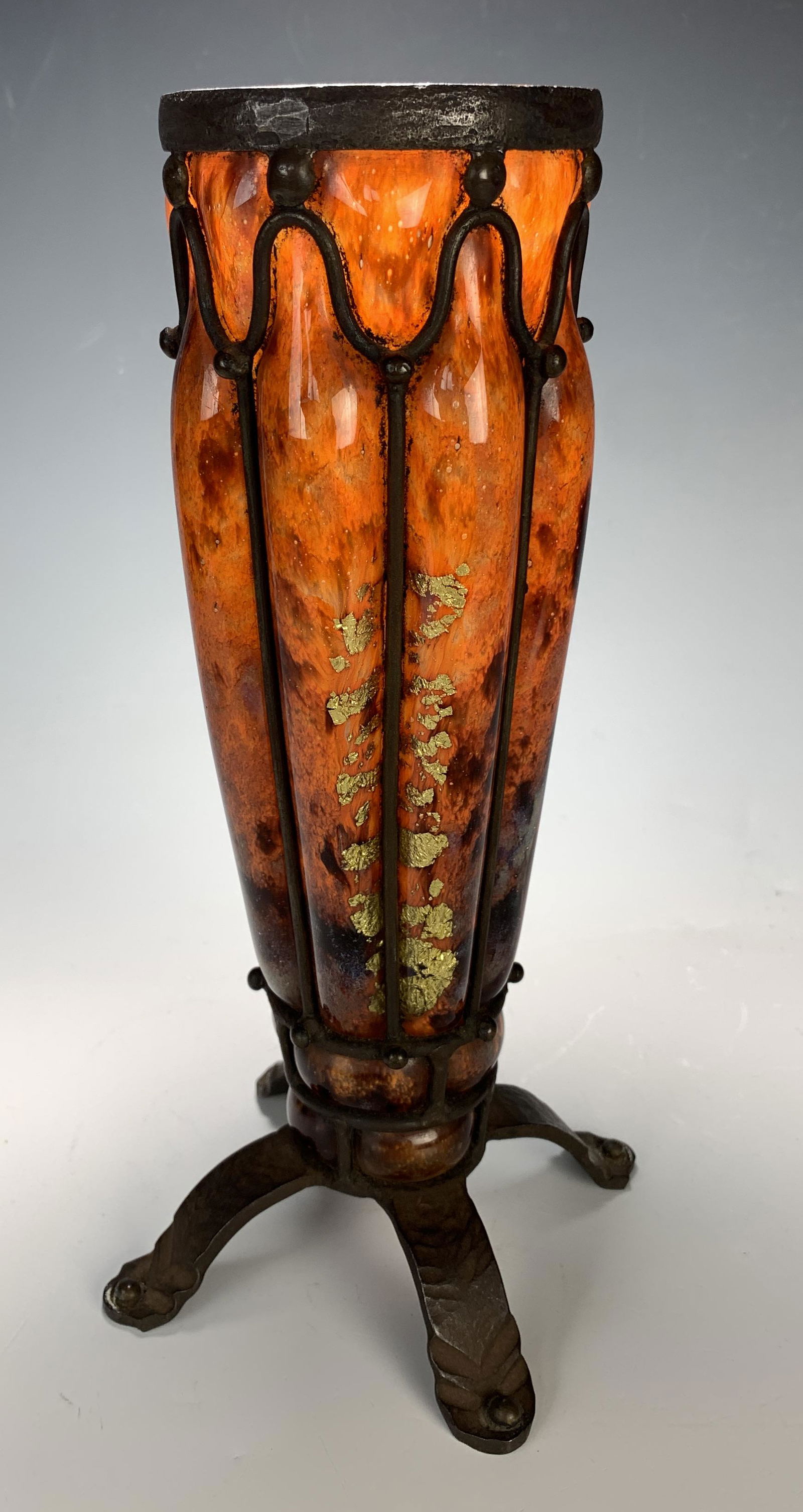 Daum Nancy & Majorelle Iron Blow Out Vase: Having beautiful shades of orange with blotches of purple and grey mottled glass. Decorated with gold fleck surrounding the vase blown into a hammered flame. Signed on bottom Daum Nancy & L. Majorelle