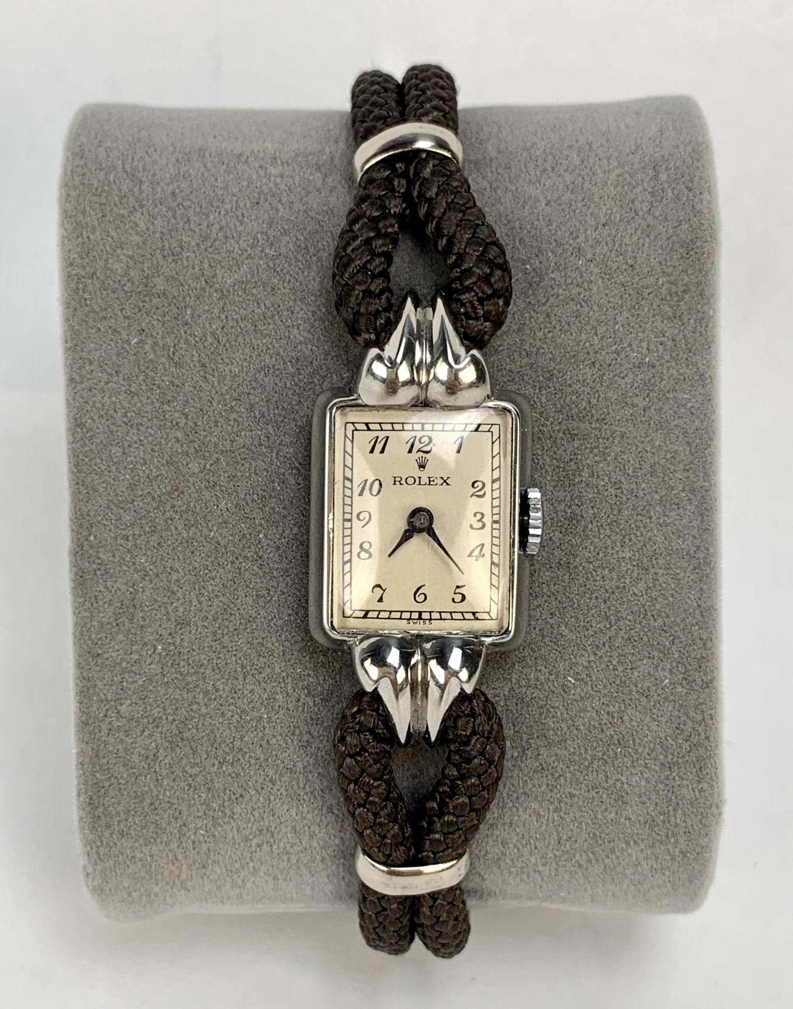 Rolex Stainless Steel 1930's Ladies Watch: Vintage Circa 1930's Rolex Ladies stainless steel watch with heavy fancy curved long lugs and thick sizable cord band, original from that period. Signed Rolex dial and case back inside, high grade 17