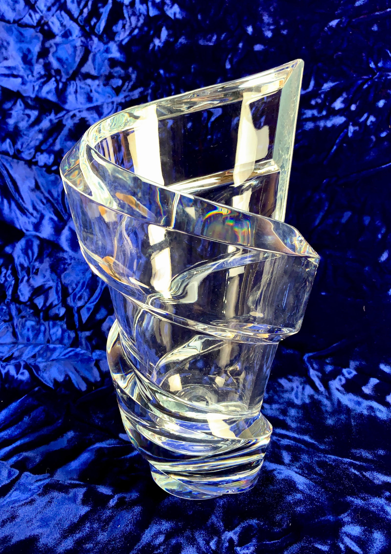 Baccarat "Spirale" Vase: Baccarat "Spirale" Vase, measures 10 1/2" high by 6" wide and weighs 7 1/2 lbs. Signed on the bottom alongside the retail sticker. Excellent condition.