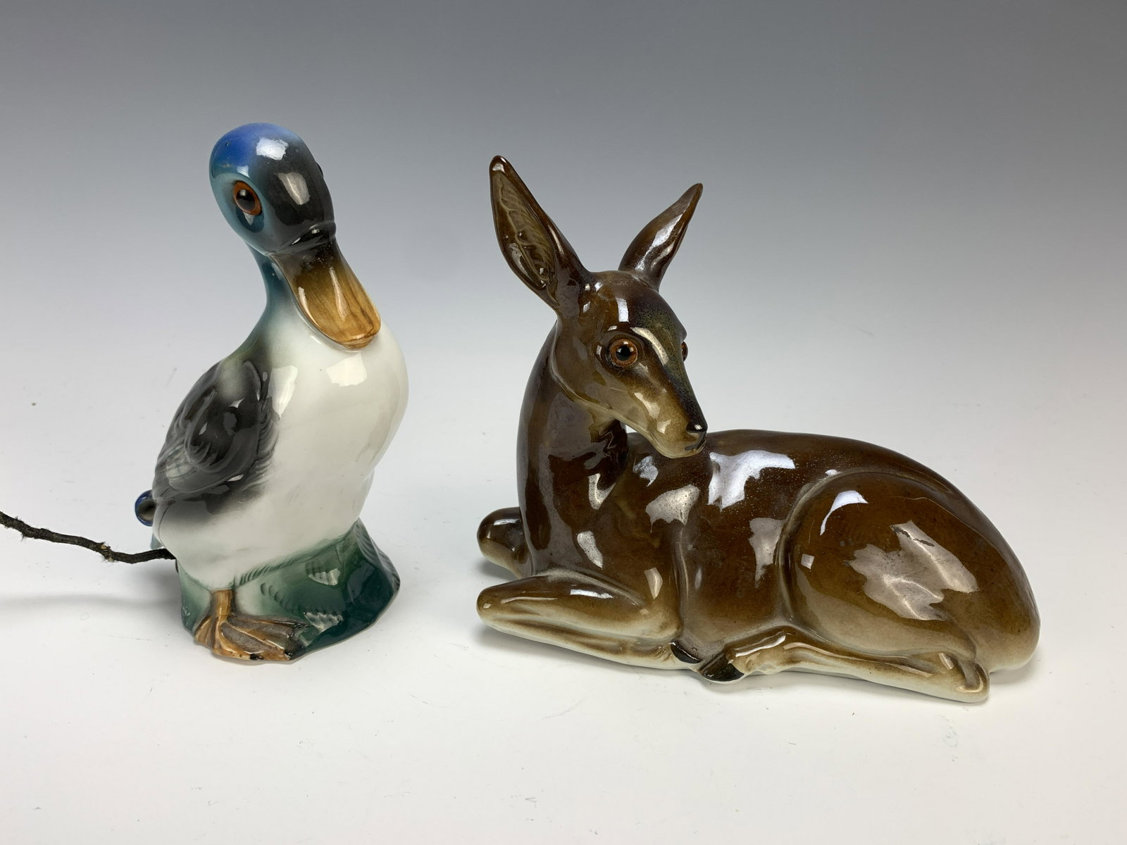 Duck & Deer Vintage Porcelain Figural Nighlights: Circa 1930. Both with original sockets and glass eyes. Plugs removed. Tallest is 8". Condition: very good. Have a similar item to sell? Email us at info@treasureseekerauction.com