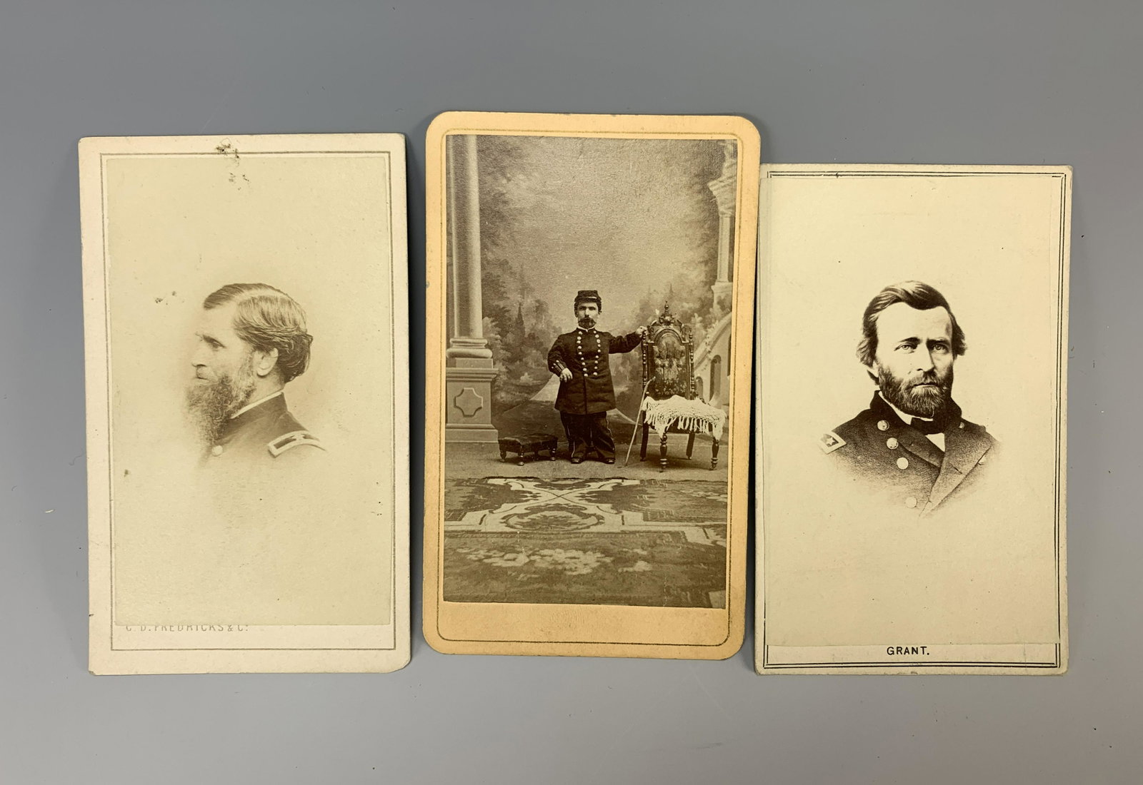 Civil War CdV Photos: CdV's (Carte de Visite) were a type of photo popular in the Civil War era, usually an albumen print and the size of a visiting card. This lot includes photos of a dwarf in Civil War uniform, President