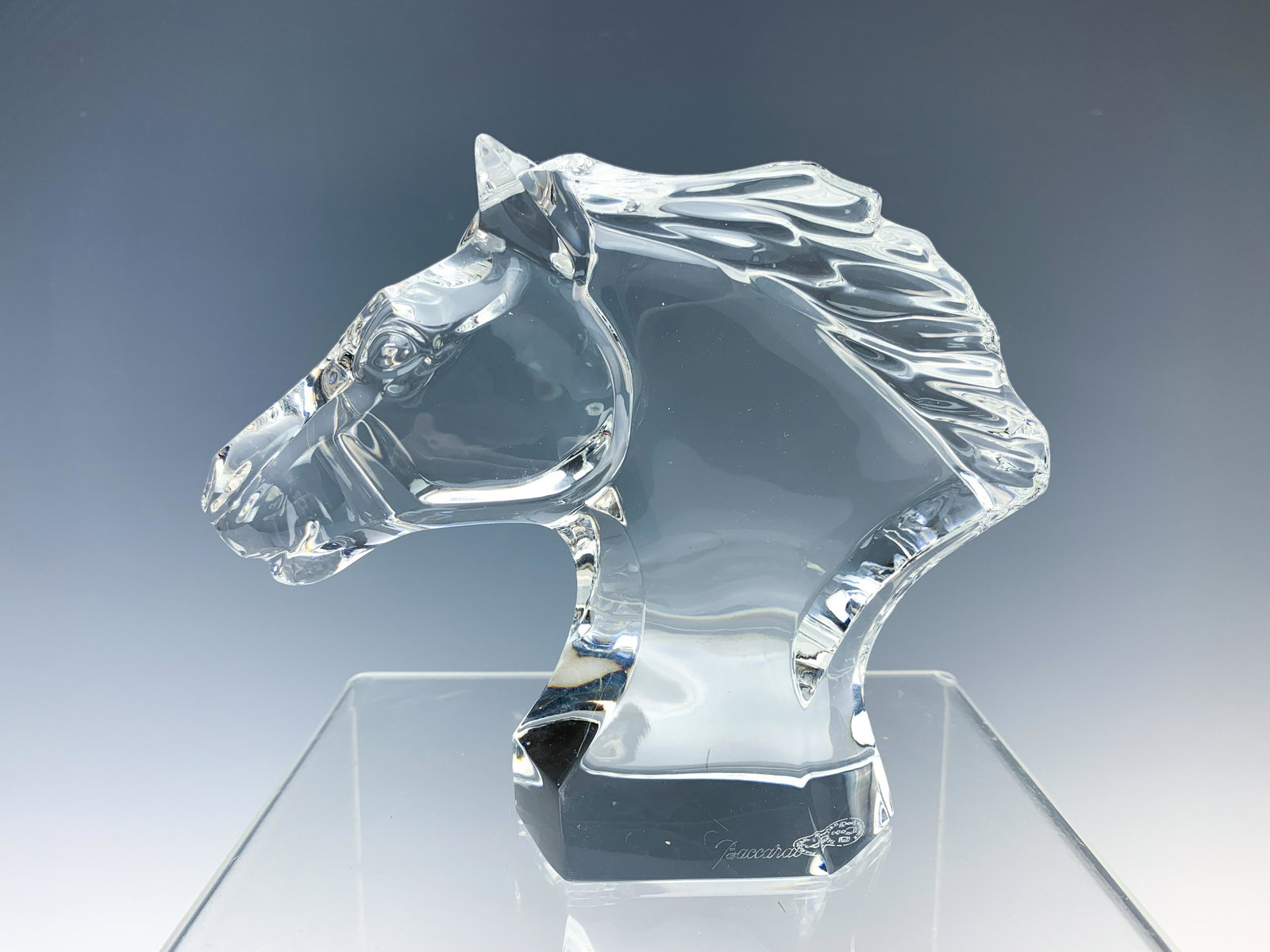 Baccarat Small Crystal Horse Head Sculpture: This piece measures 4 1/2" high x 5 3/4" wide by 1 7/8" deep and weighs 722 grams. Condition is excellent.