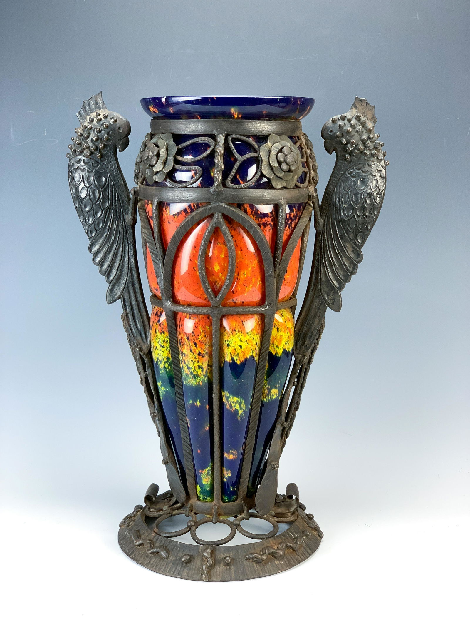 Chapelle And Muller Freres Glass + Iron Parakeets: Circa 1925. Art Deco at its finest. Glass made by Muller Brothers in Luneville, France and ironwork by Leon Chapelle, wrought iron worker from Lay St. Christophe. Beautiful mottled glass in colors of