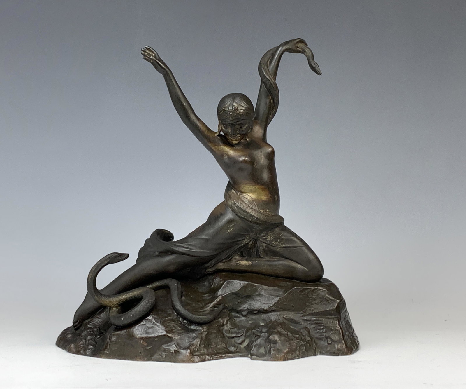 Theophile Somme (1871-1952) Bronze Lady & Snakes: Circa 1920. Great Art Deco period bronze of a semi nude female who is a snake charmer. Signed on the side Th. Somme - Medalle Dor La Salon. Size: 12.75" tall x 12.5" wide. Condition: wear to patina.