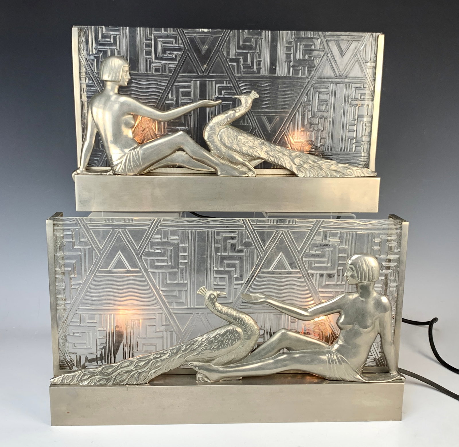 Rare Pair Art Deco Sconces Nude Lady w/Peacock: Talk about Deco! These fabulous wall sconces are as Deco as you can get. Made in France, circa 1920s, this pair of nickel-plated wall lamps is decorated with a nude reclining lady feeding a peacock. T
